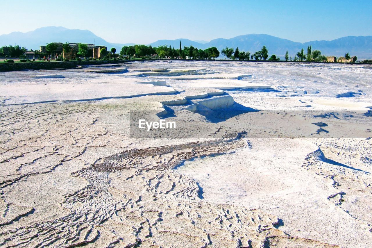 View of salt basin against sky