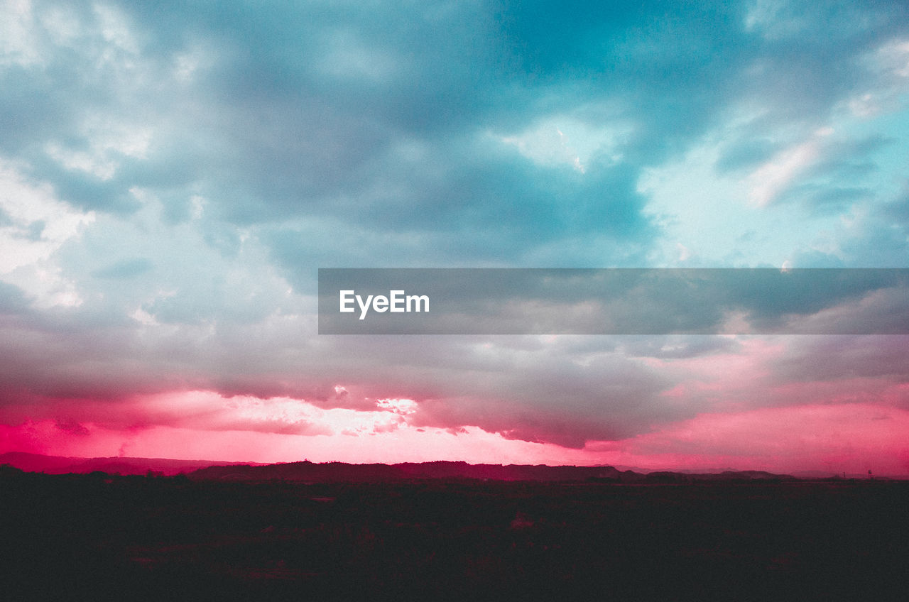 SCENIC VIEW OF STORM CLOUDS OVER SKY