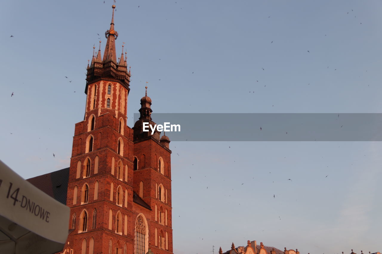 LOW ANGLE VIEW OF CATHEDRAL AGAINST SKY