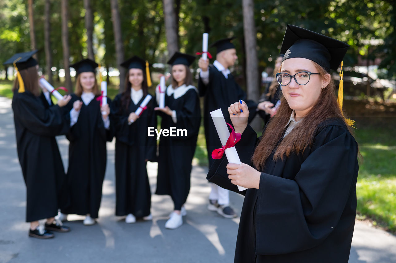 rear view of woman wearing graduation