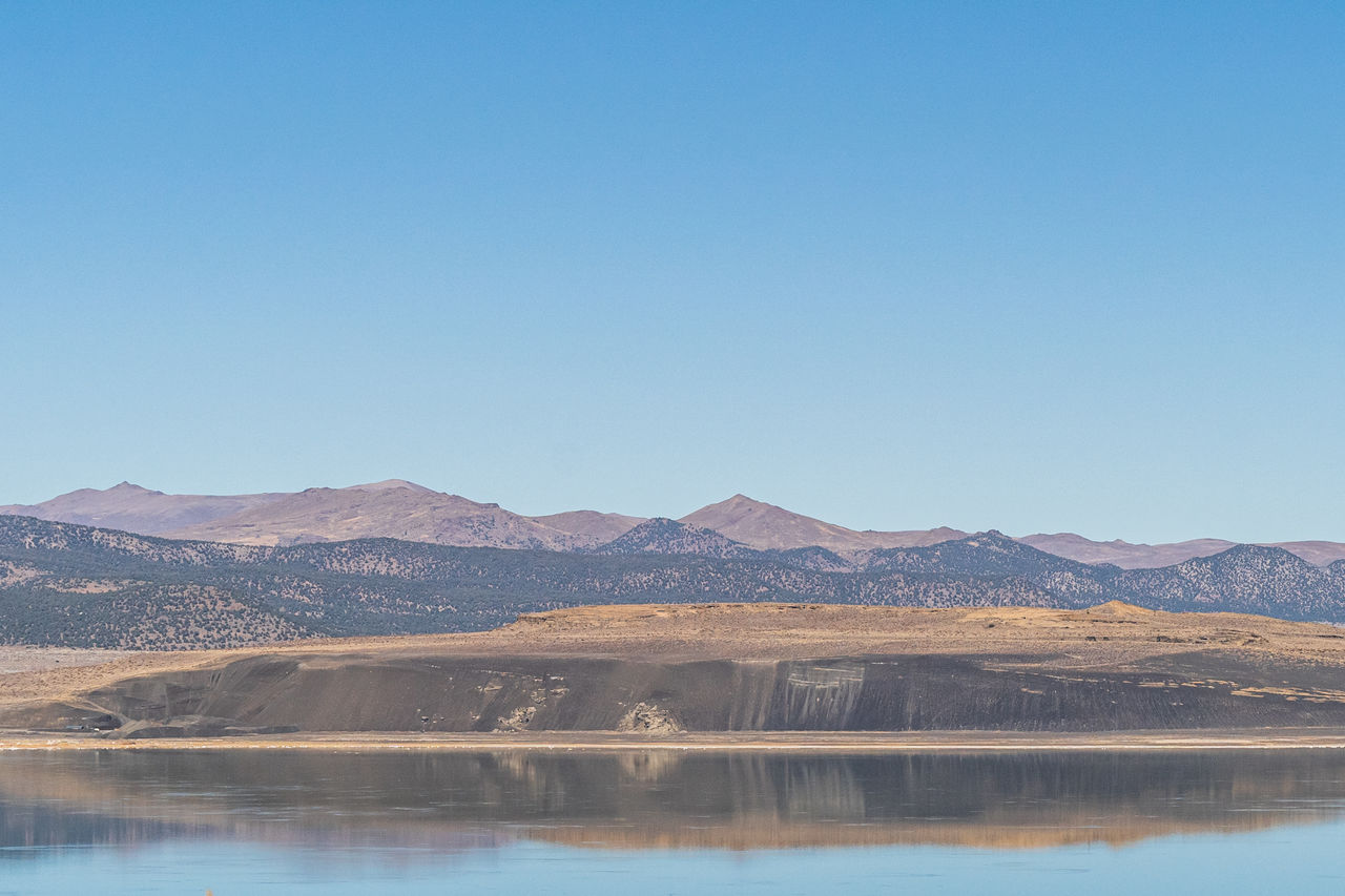 Mono lake, california in autumn on sunny day with clear blue sky and tufa formations. sierra nevada