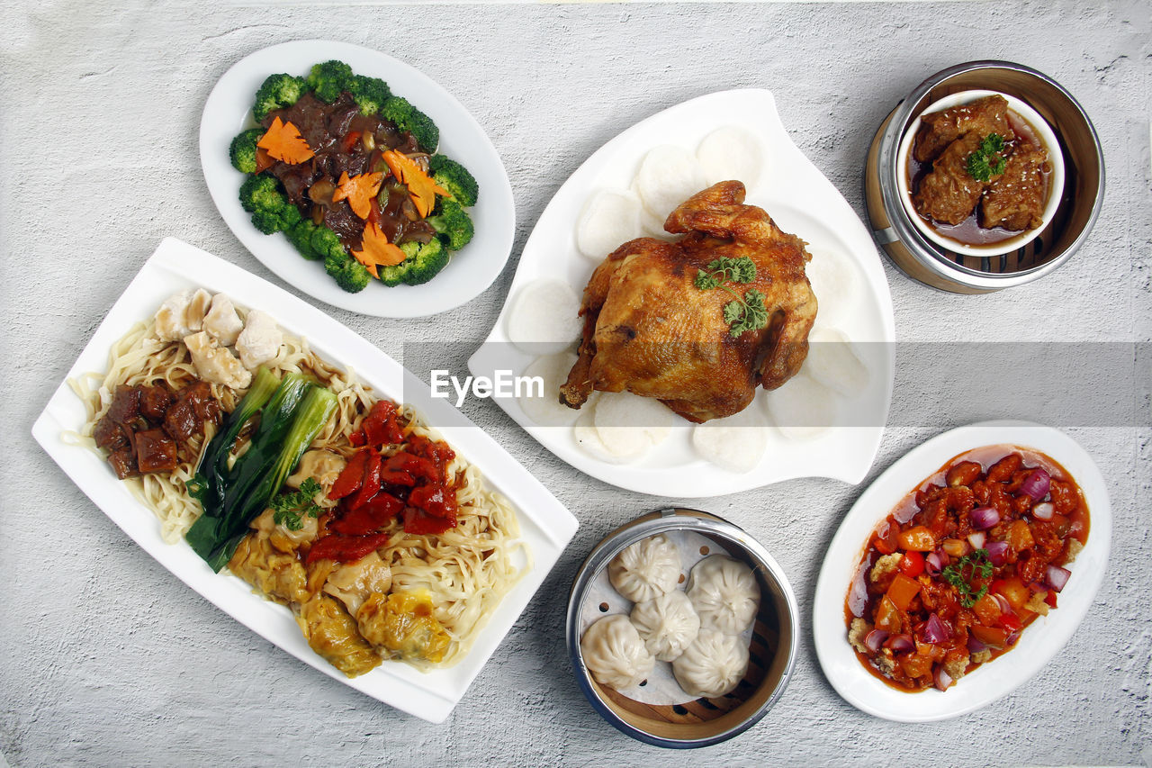 high angle view of food served in plates on table