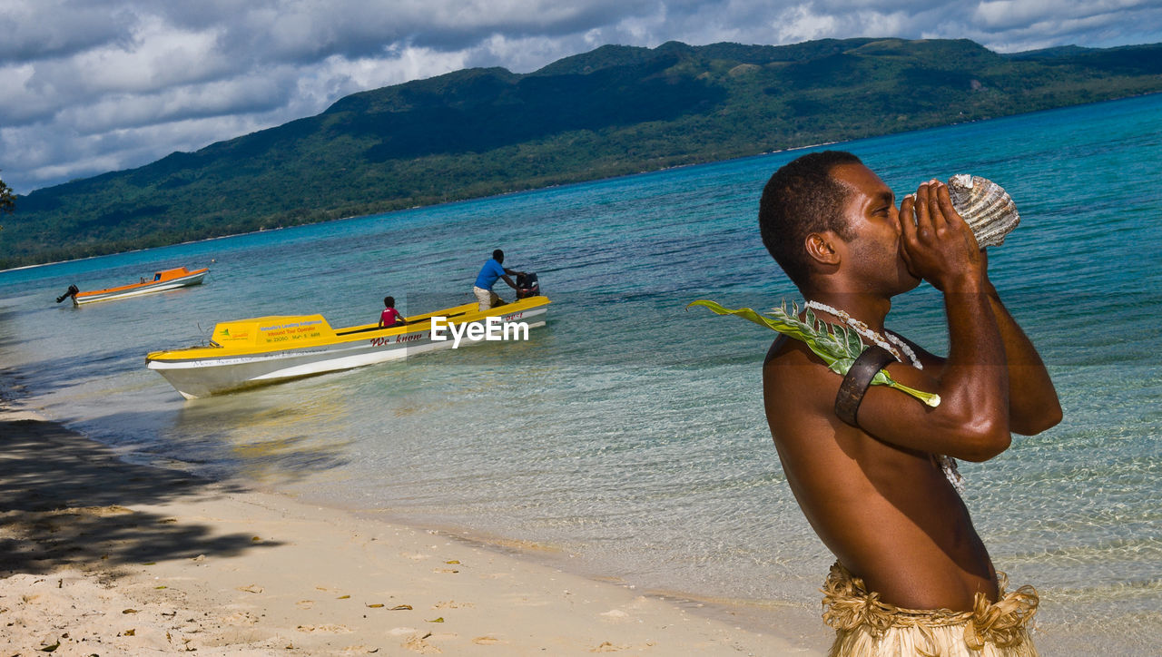 PEOPLE ON BEACH