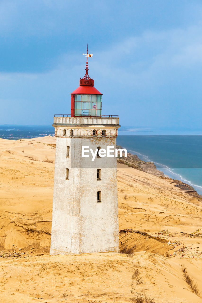 Rabjerg mile a lighthouse on the danish coast in a sand dune