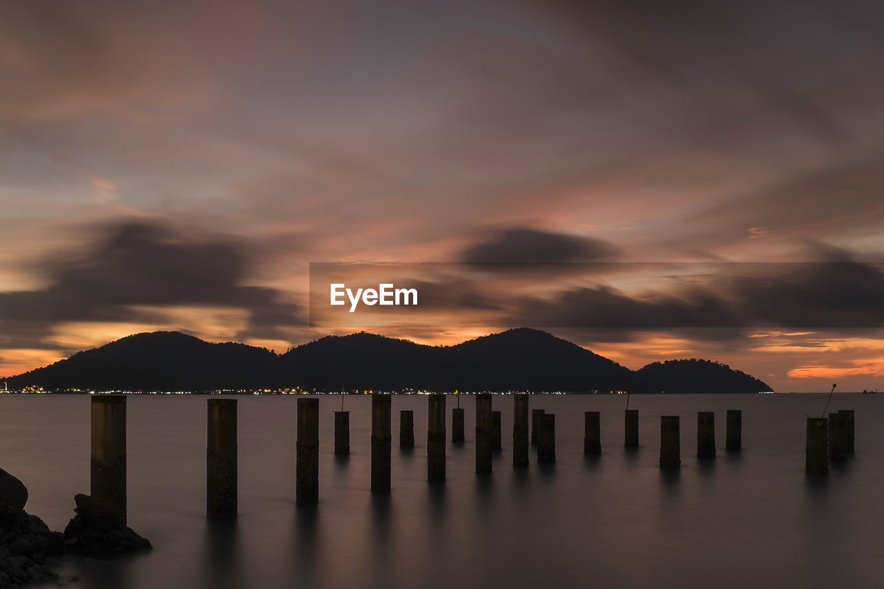 Panoramic view of sea against sky during sunset