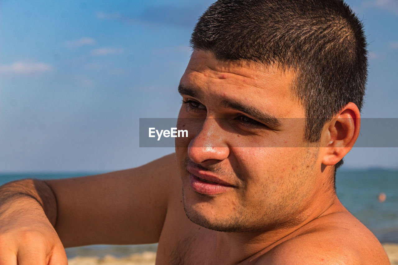 CLOSE-UP PORTRAIT OF MAN WITH REFLECTION