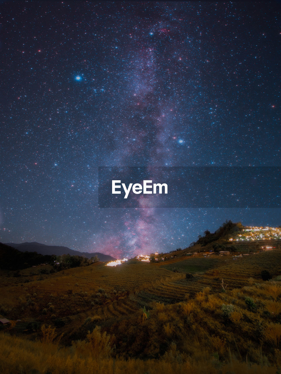 Scenic view of star field against sky at night