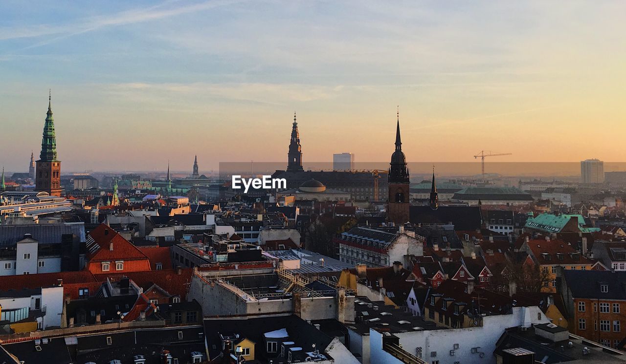 View of copenhagen cityscape against sky