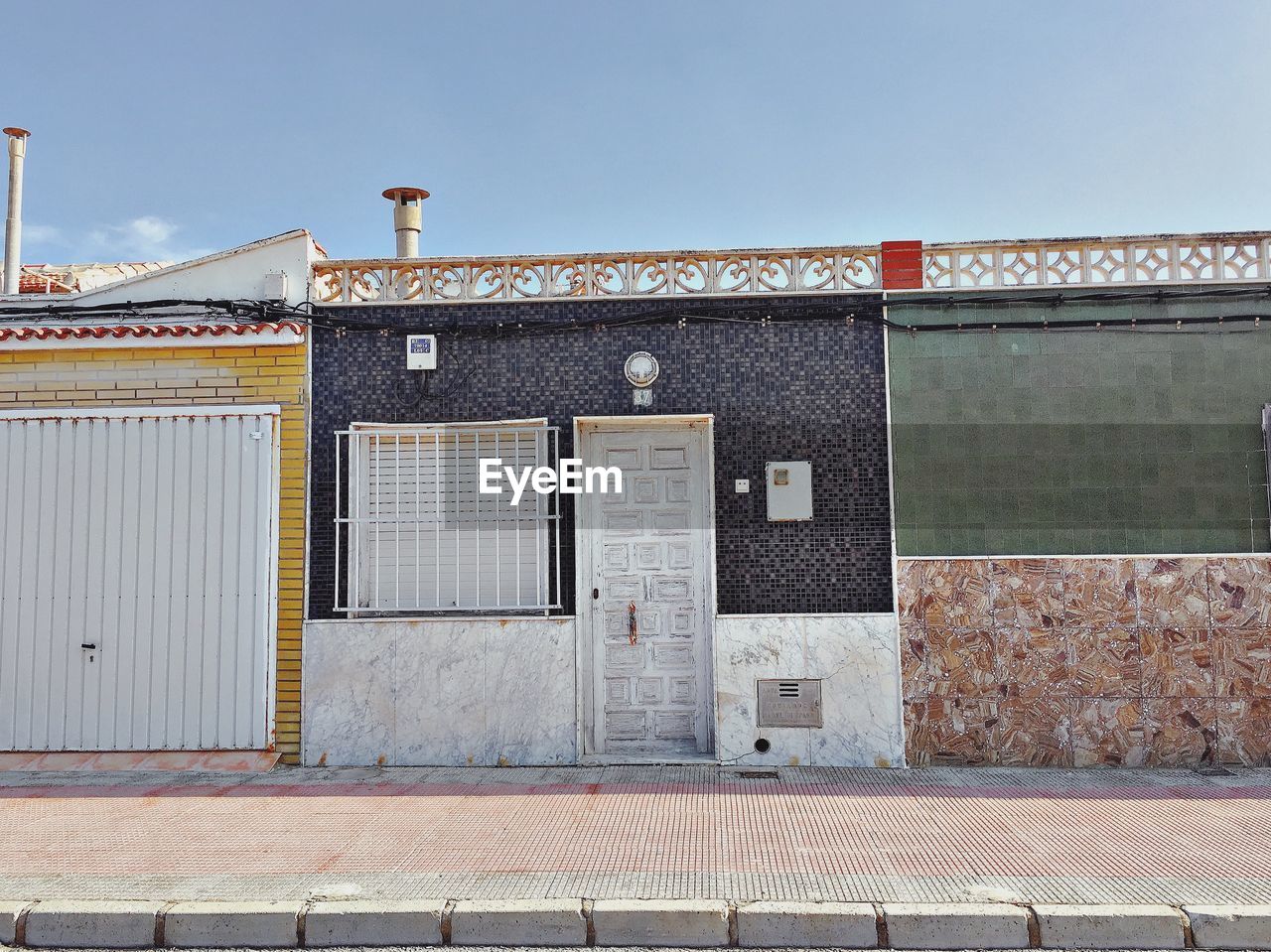 EXTERIOR OF BUILDINGS AGAINST SKY