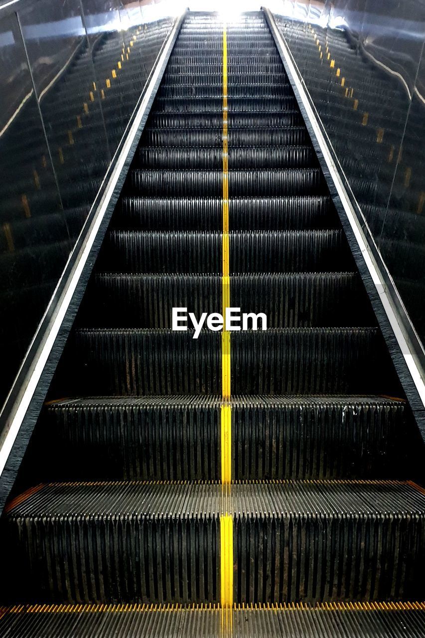 LOW ANGLE VIEW OF ESCALATOR