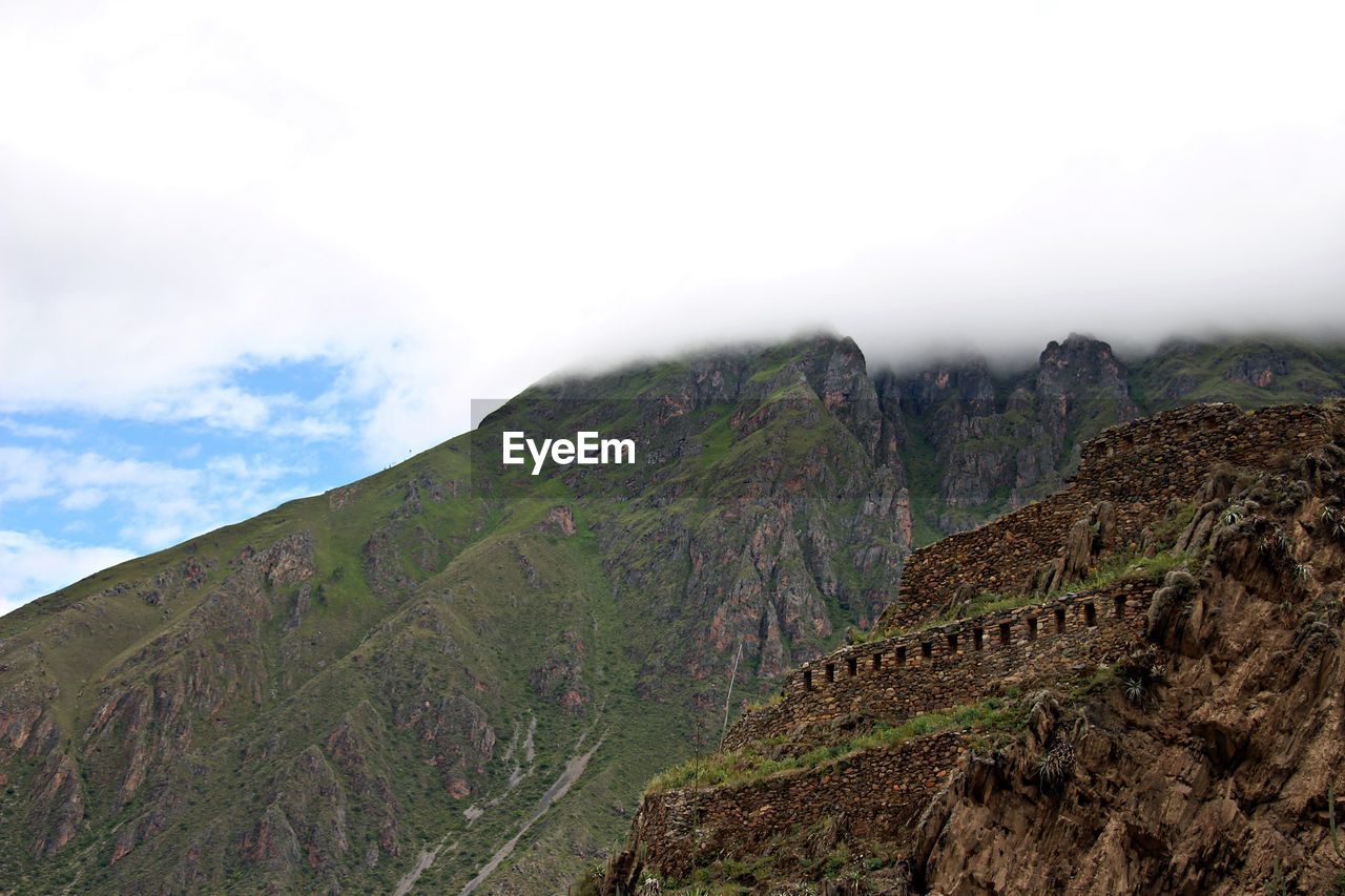 SCENIC VIEW OF MOUNTAIN AGAINST SKY