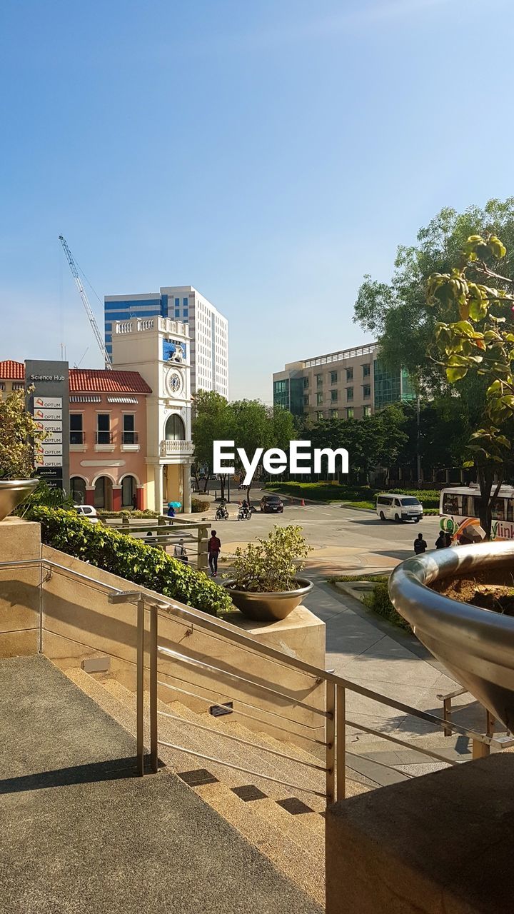 VIEW OF CITY AGAINST CLEAR BLUE SKY