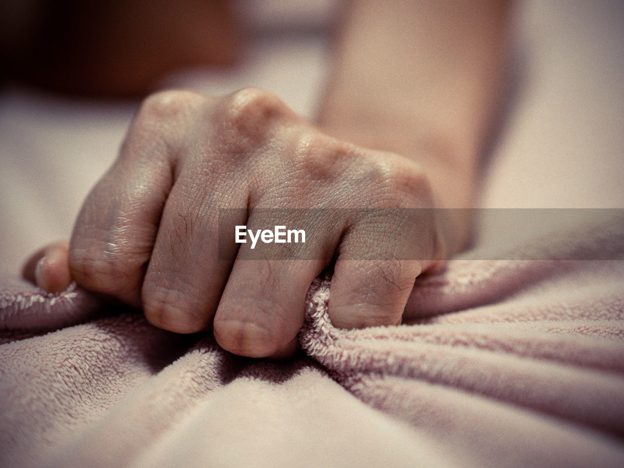 Close-up of woman hand on holding towel