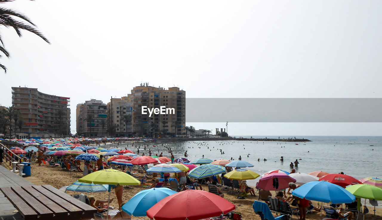 GROUP OF PEOPLE ON BEACH