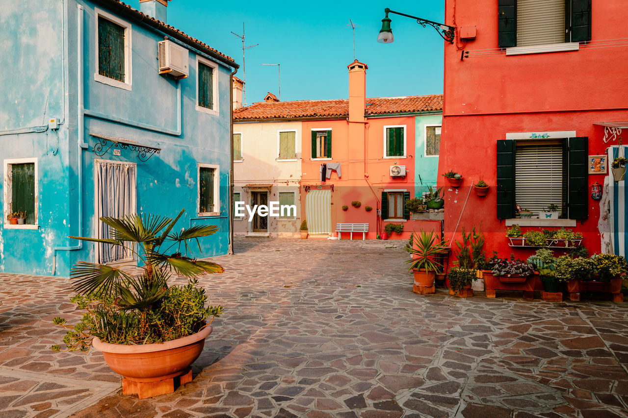 Burano square with characteristic houses colorful houses