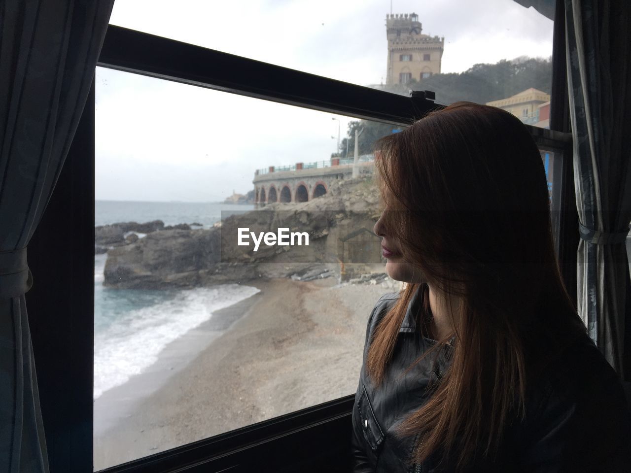 WOMAN LOOKING AT VIEW