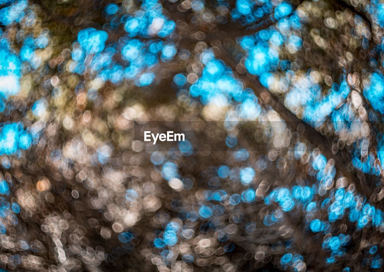 Full frame shot of blue sky and bokeh 