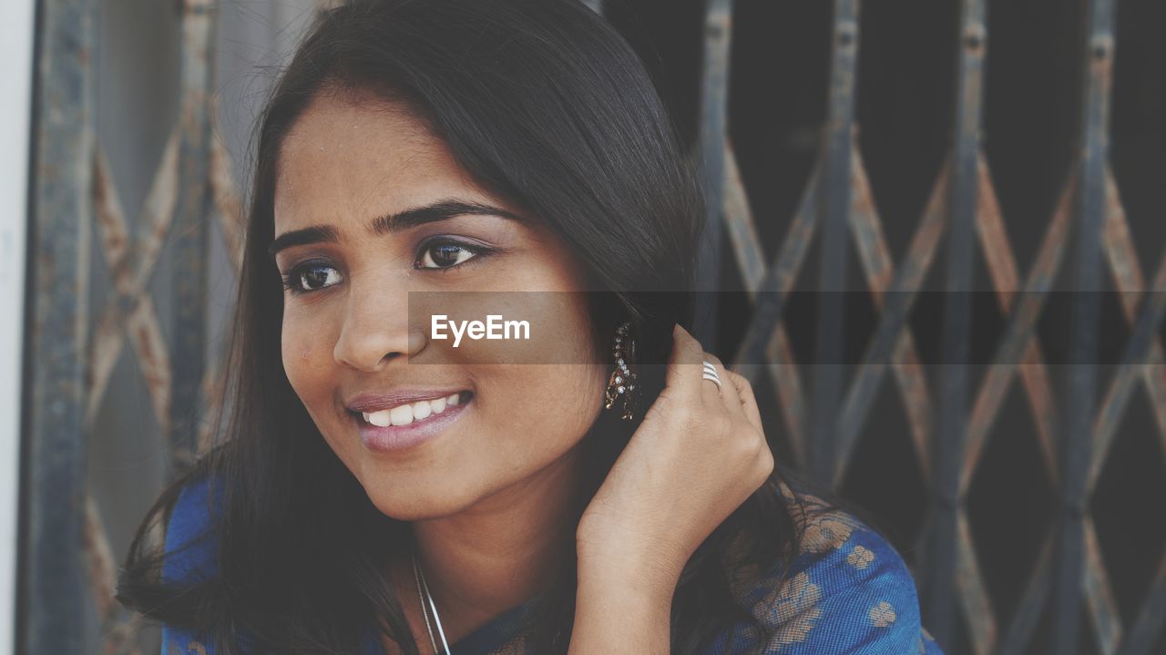 Portrait of smiling young woman