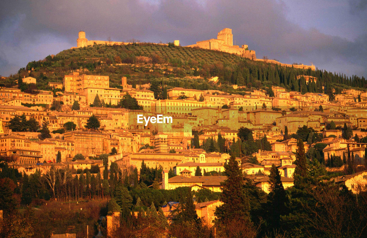 View of ancient, medieval cityscape at sunset