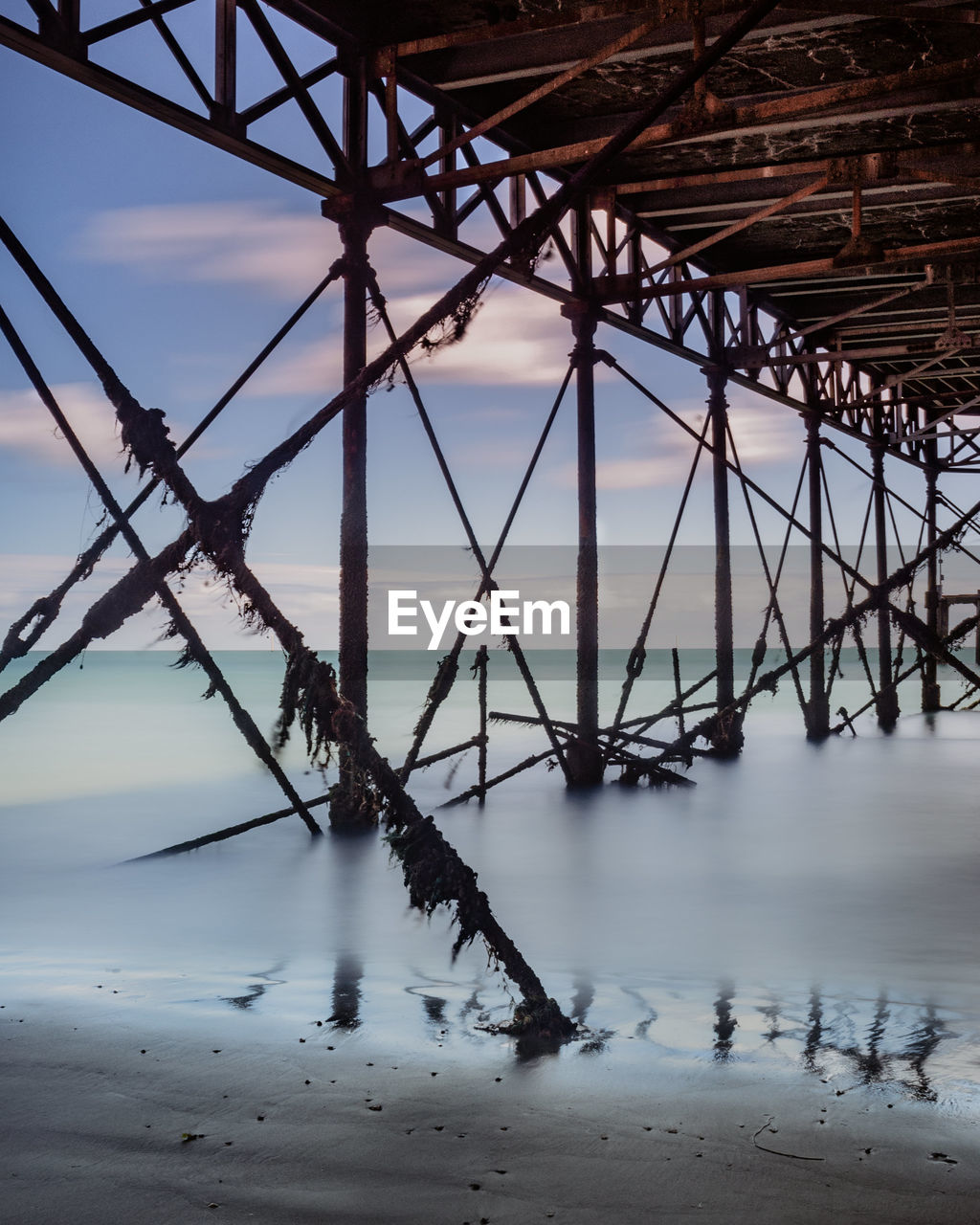Long exposure of the sea under southsea pier in portsmouth . . .
