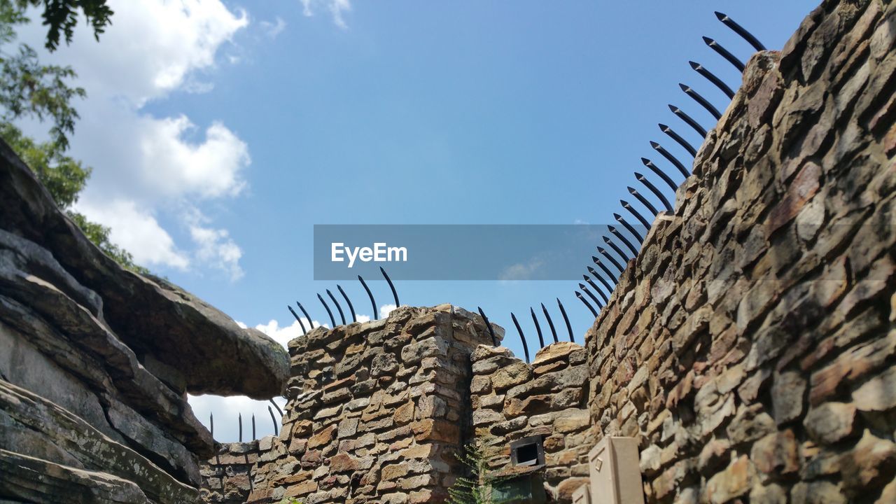 Low angle view of building old fort against sky