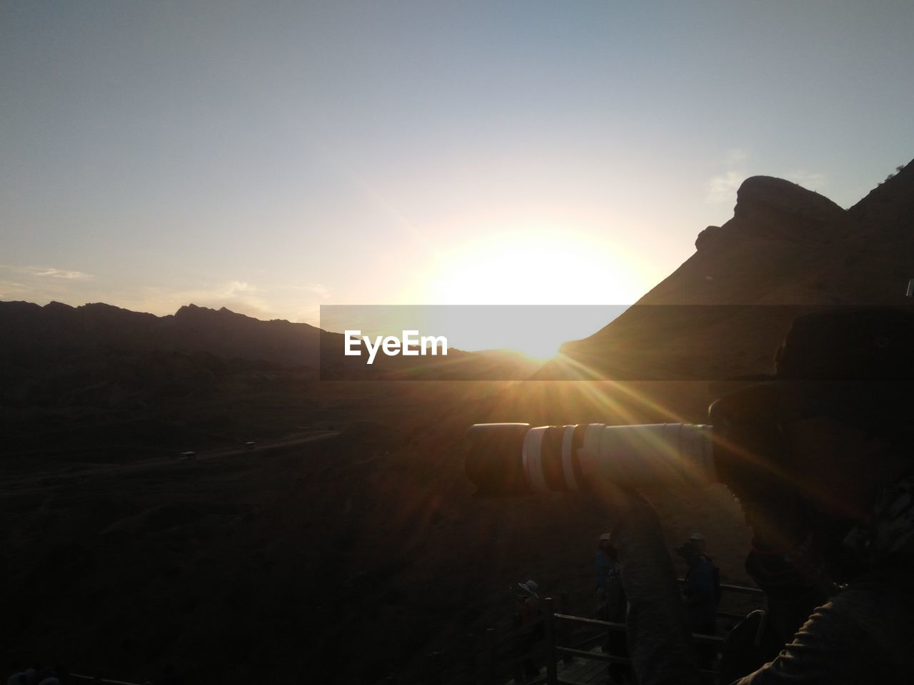 SCENIC VIEW OF SUNSET OVER MOUNTAIN