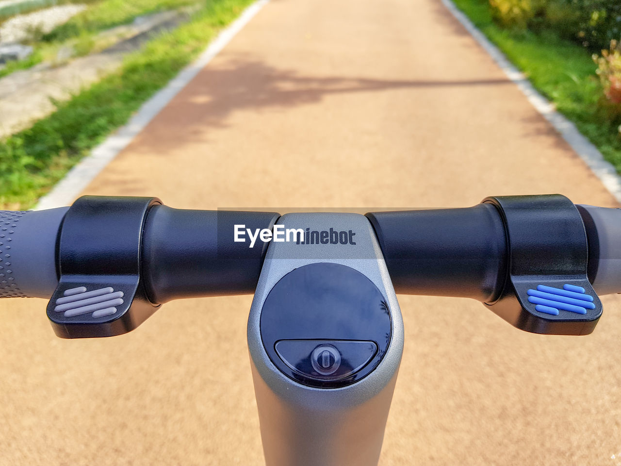 HIGH ANGLE VIEW OF BICYCLE WITH ROAD