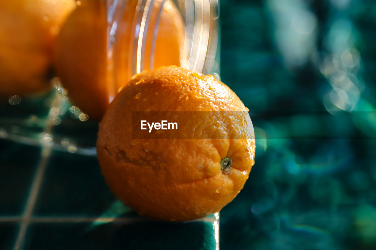Close-up of orange slice in water