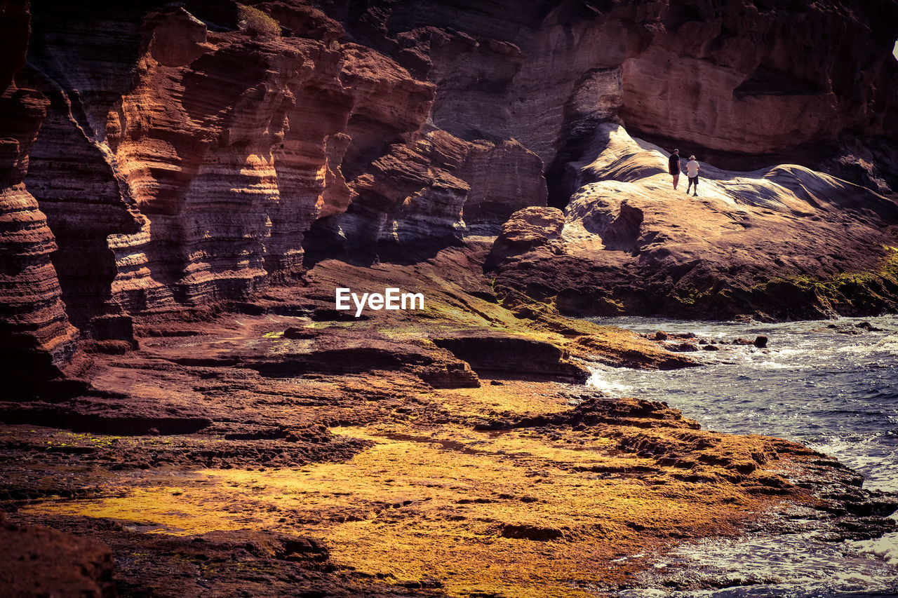 VIEW OF ROCK FORMATIONS IN WATER