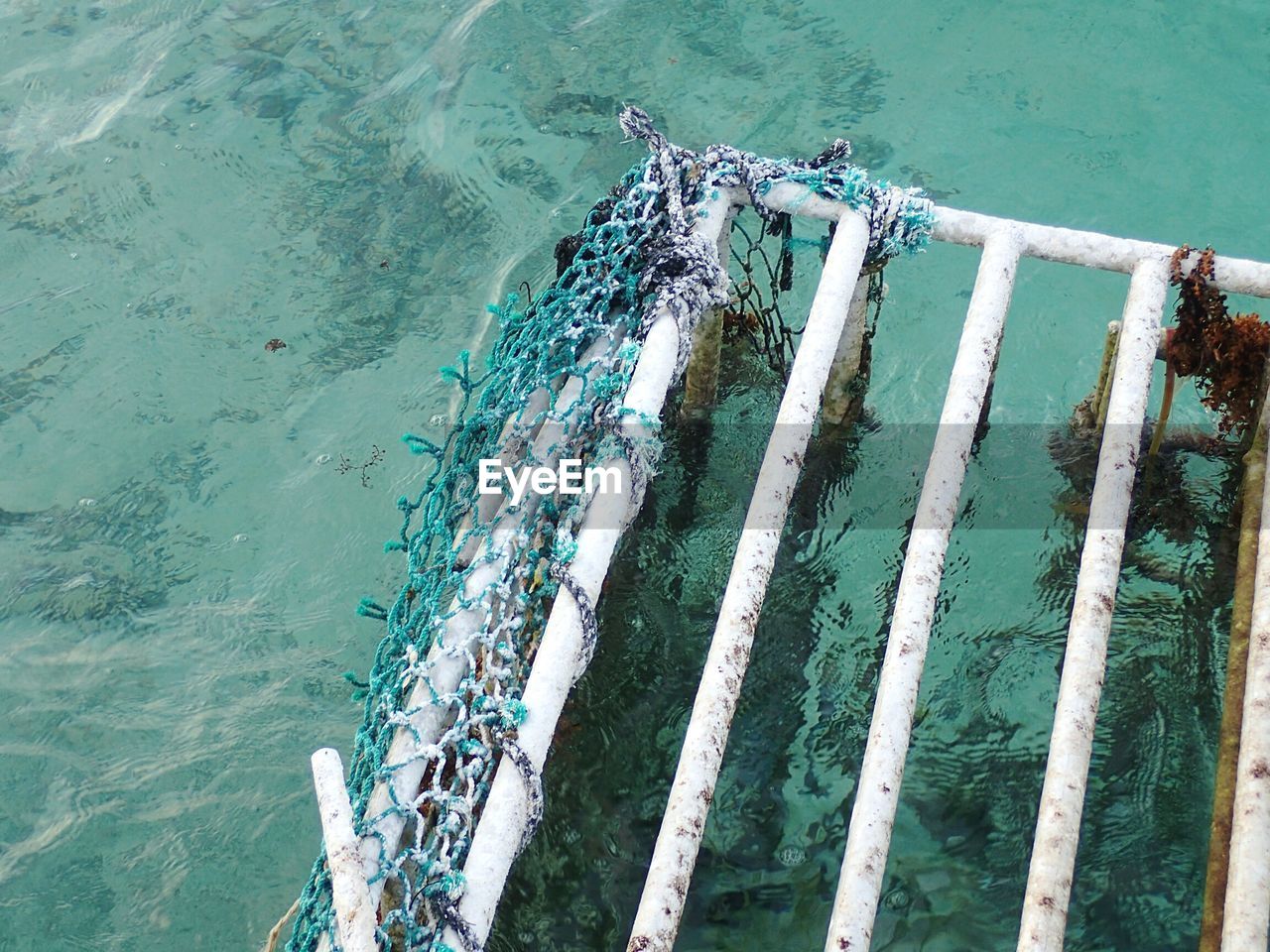 High angle view of safety cage in sea