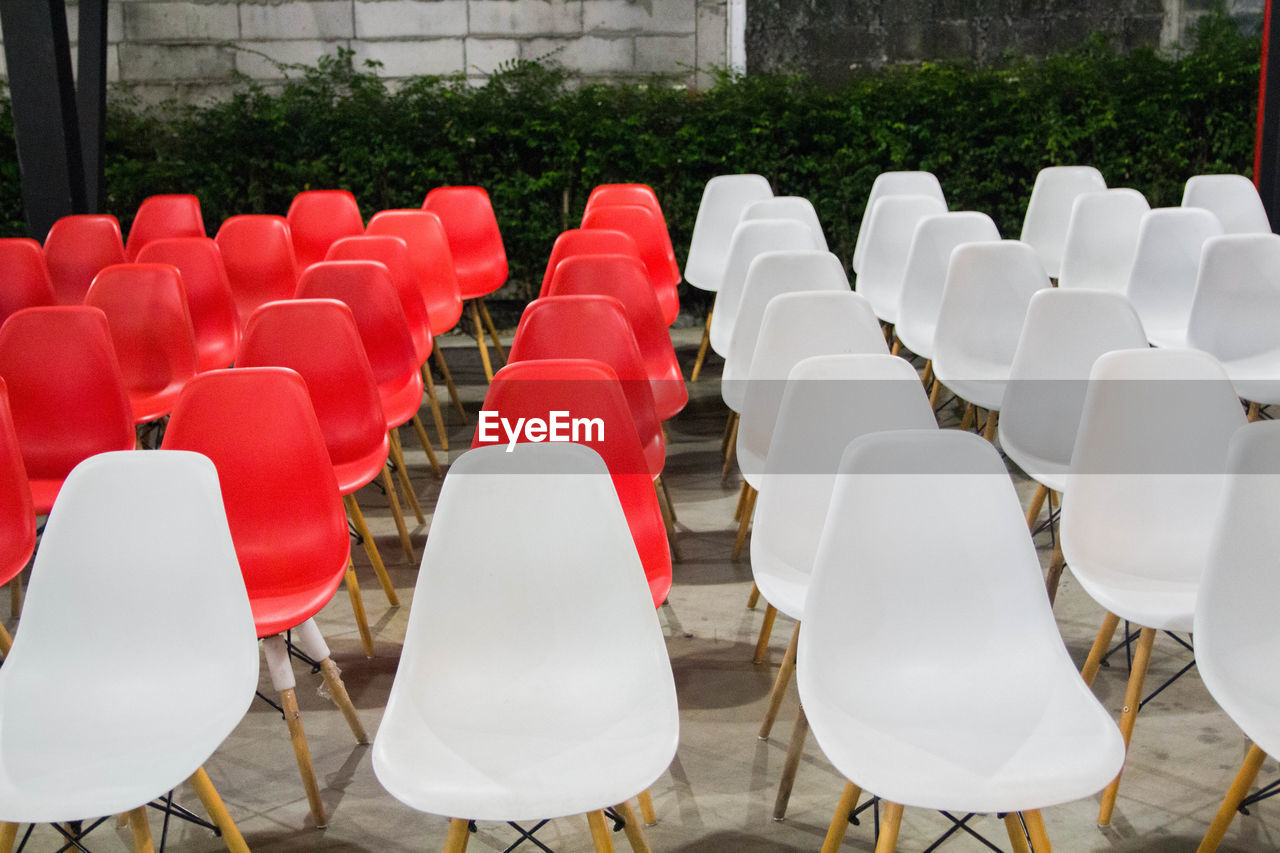 High angle view of empty chairs in stadium