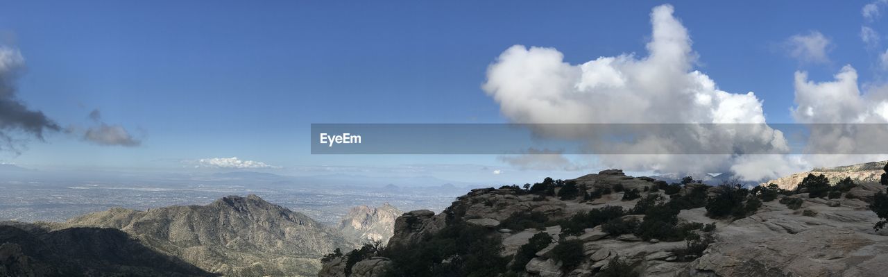 PANORAMIC VIEW OF VOLCANIC MOUNTAIN AGAINST SKY