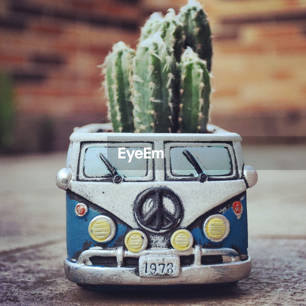 CLOSE-UP OF TOY CAR ON TABLE AT HOME