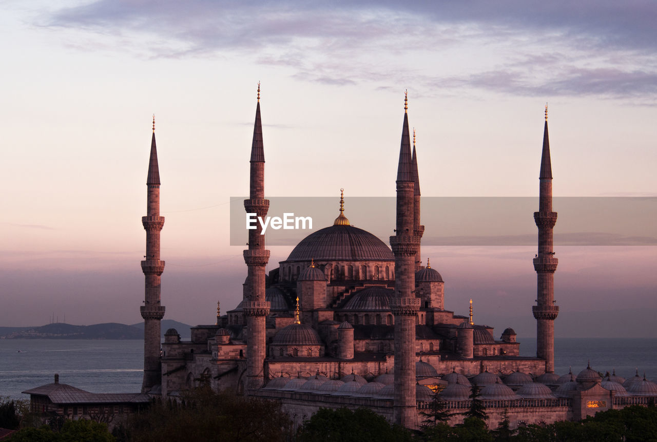 View of blue mosque at sunset