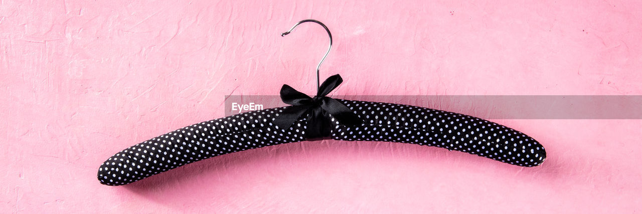 pink, no people, indoors, moustache, fashion accessory, purple, animal, pink background, studio shot, animal themes