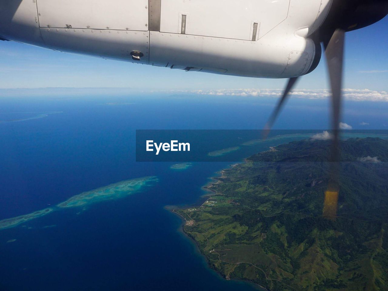 AERIAL VIEW OF SEA AND AIRPLANE