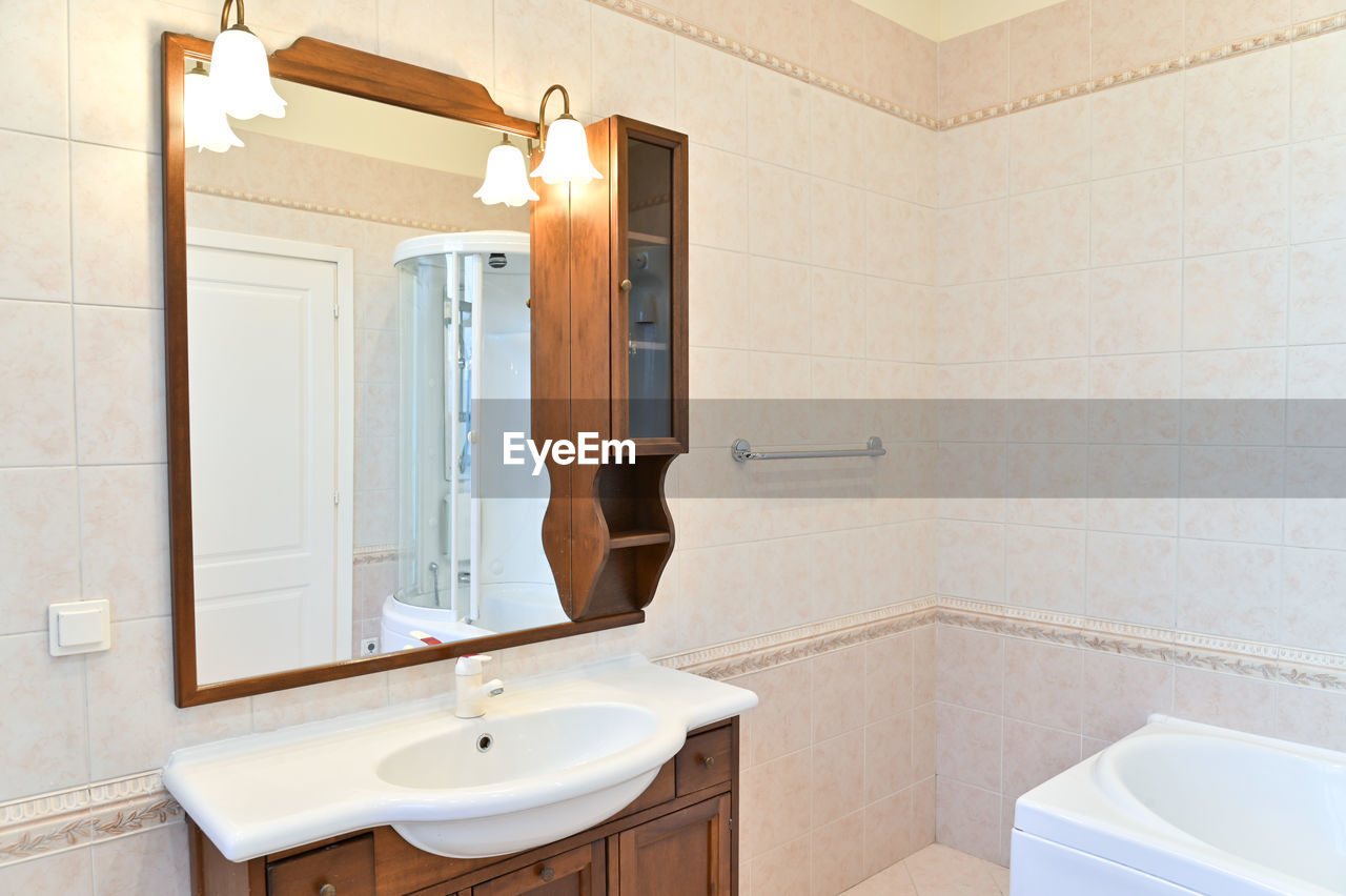 Shower cabin a clean white bathroom, modern design.