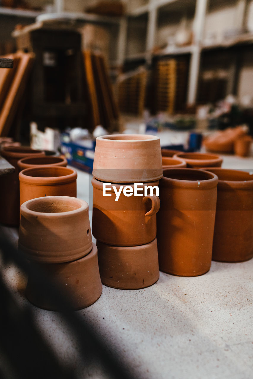 Raw ceramic cups in the artisan workshop of grottaglie, puglia