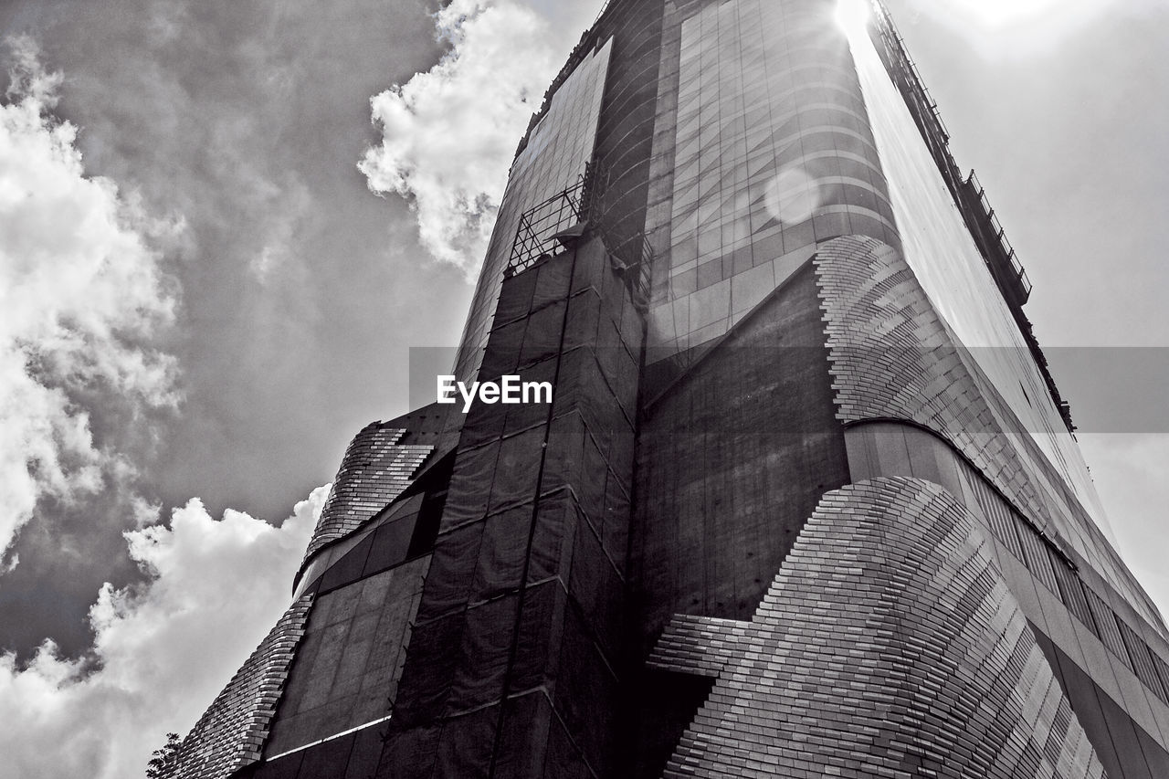 LOW ANGLE VIEW OF OFFICE BUILDING AGAINST SKY