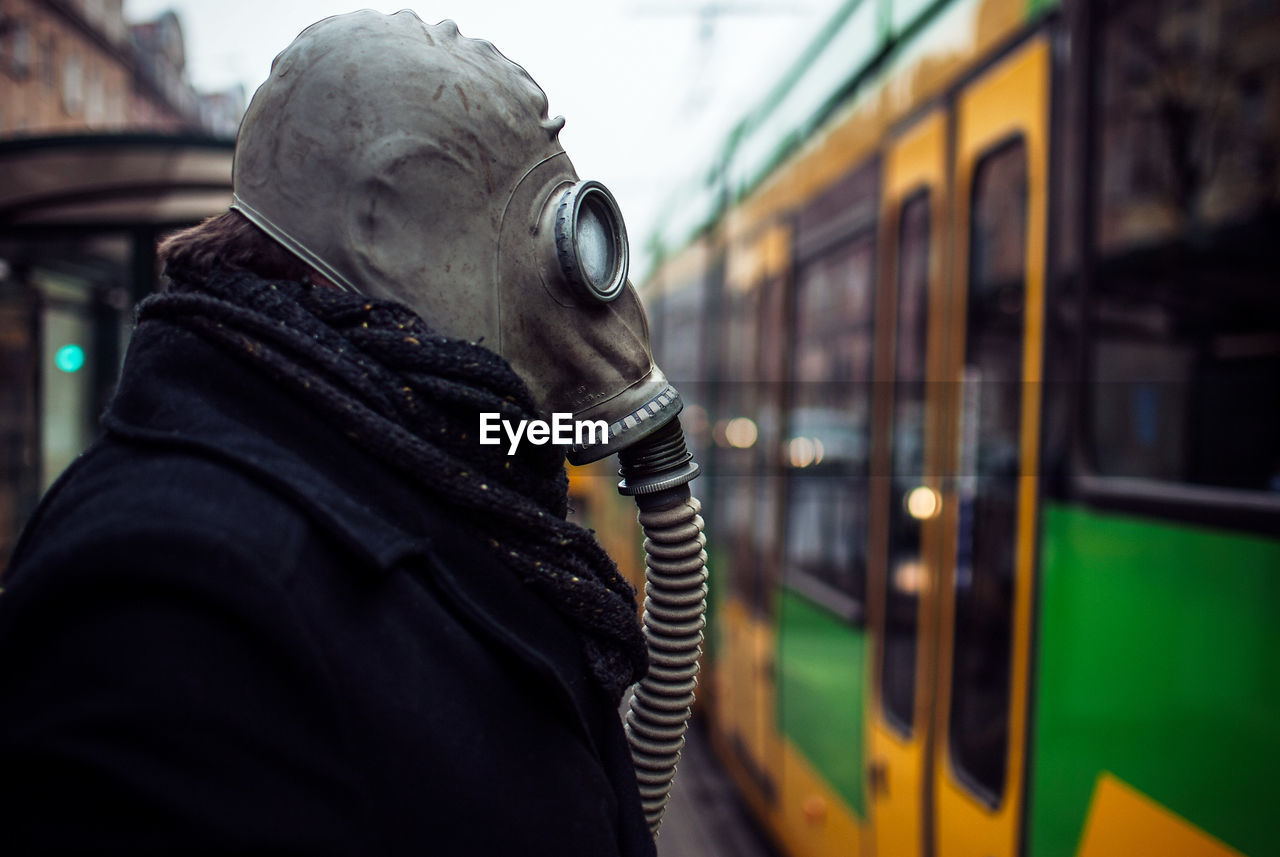 Close-up of man wearing gas mask