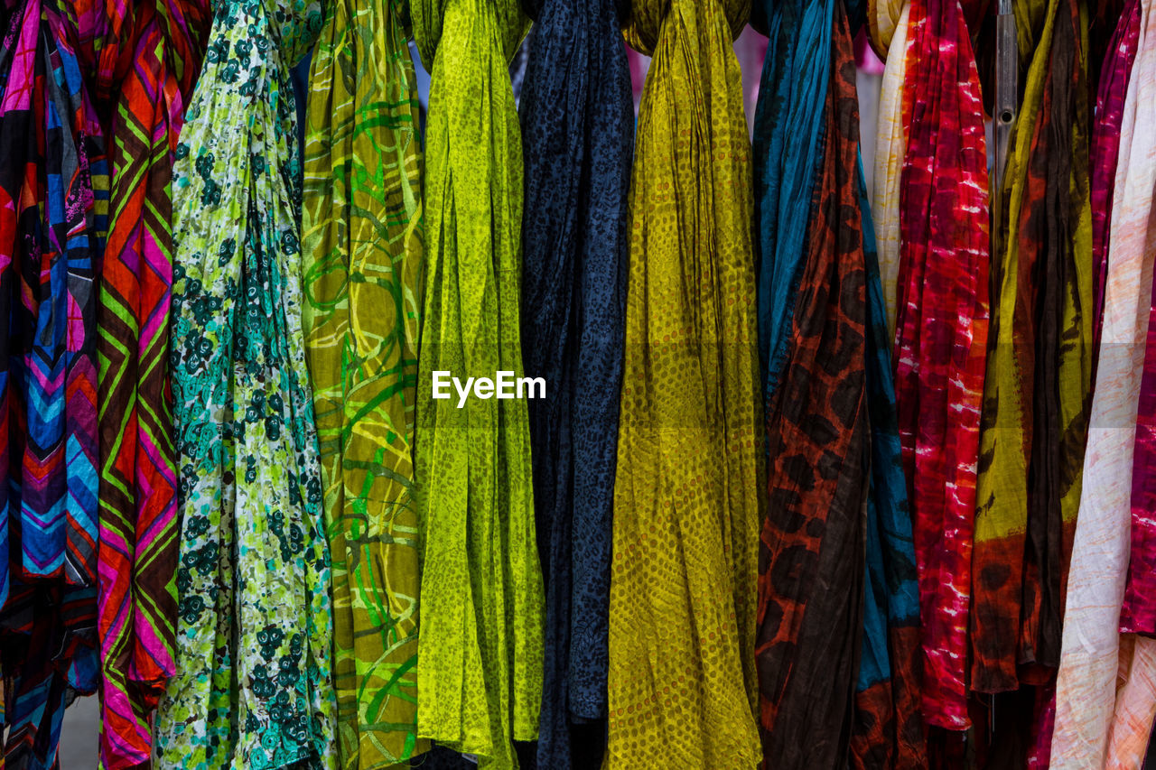 Full frame shot of multi colored fabrics for sale in market