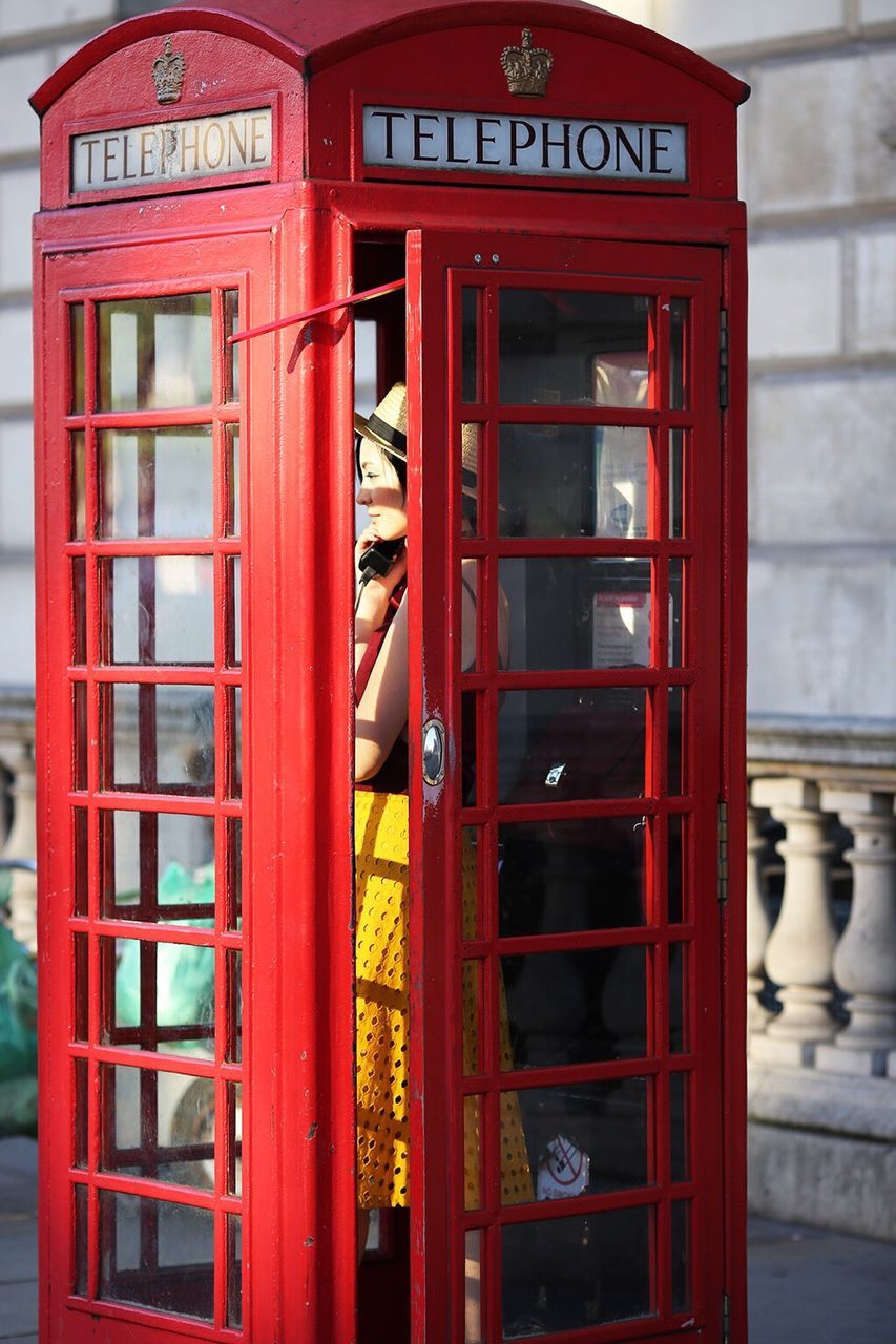 Close-up of red telephone booth