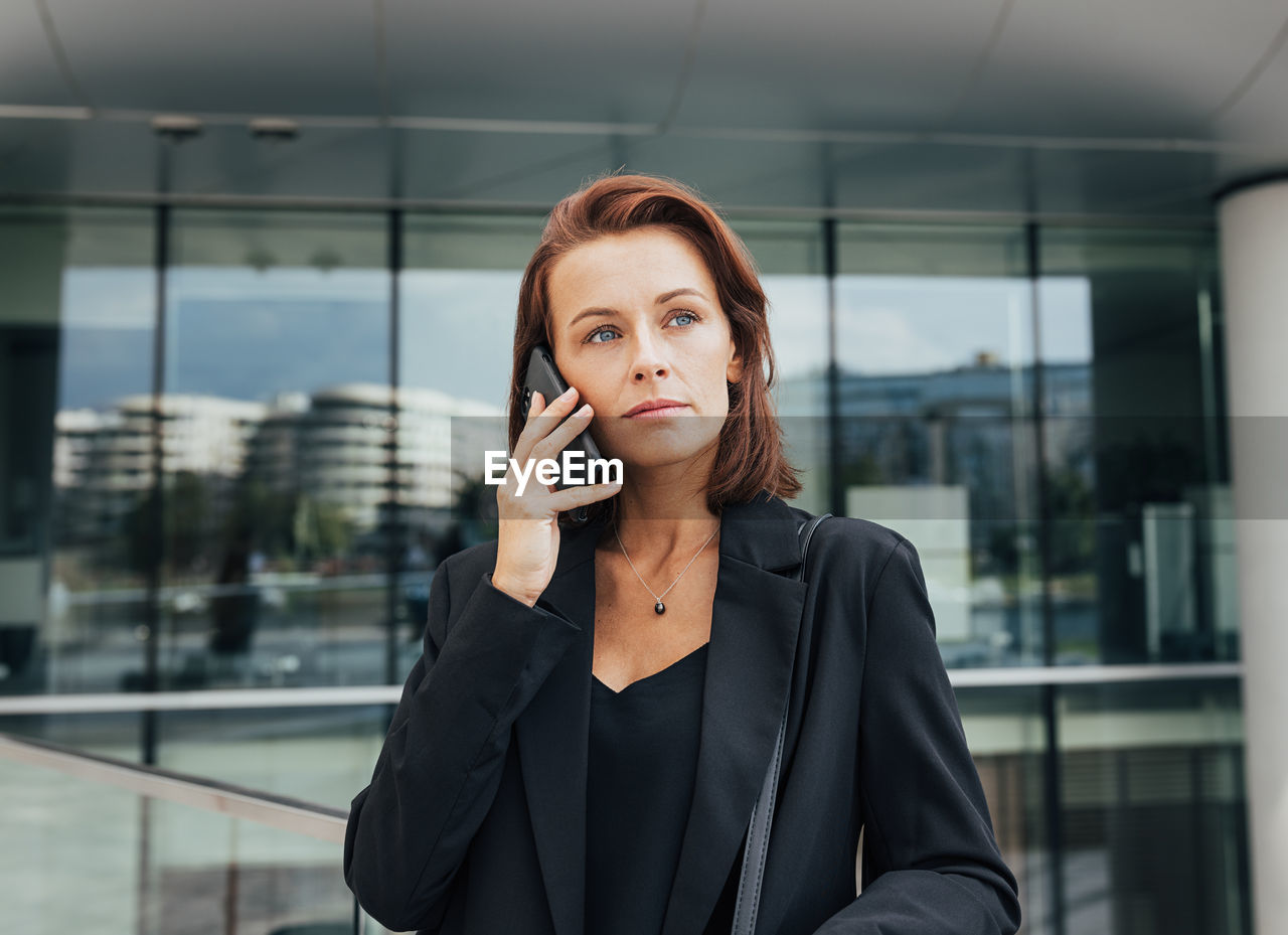 young businesswoman talking on mobile phone