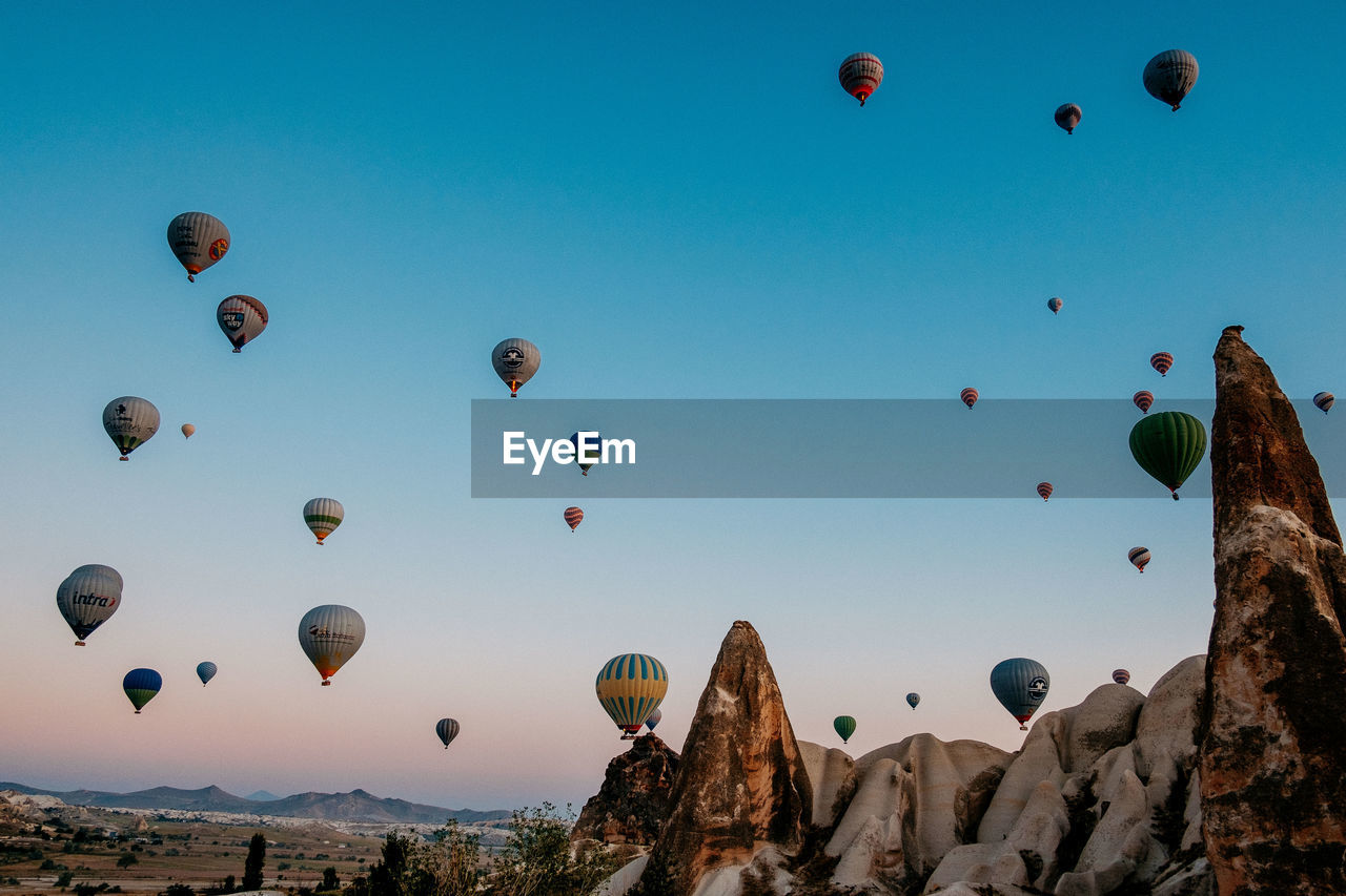 Low angle view of hot air balloons in sky