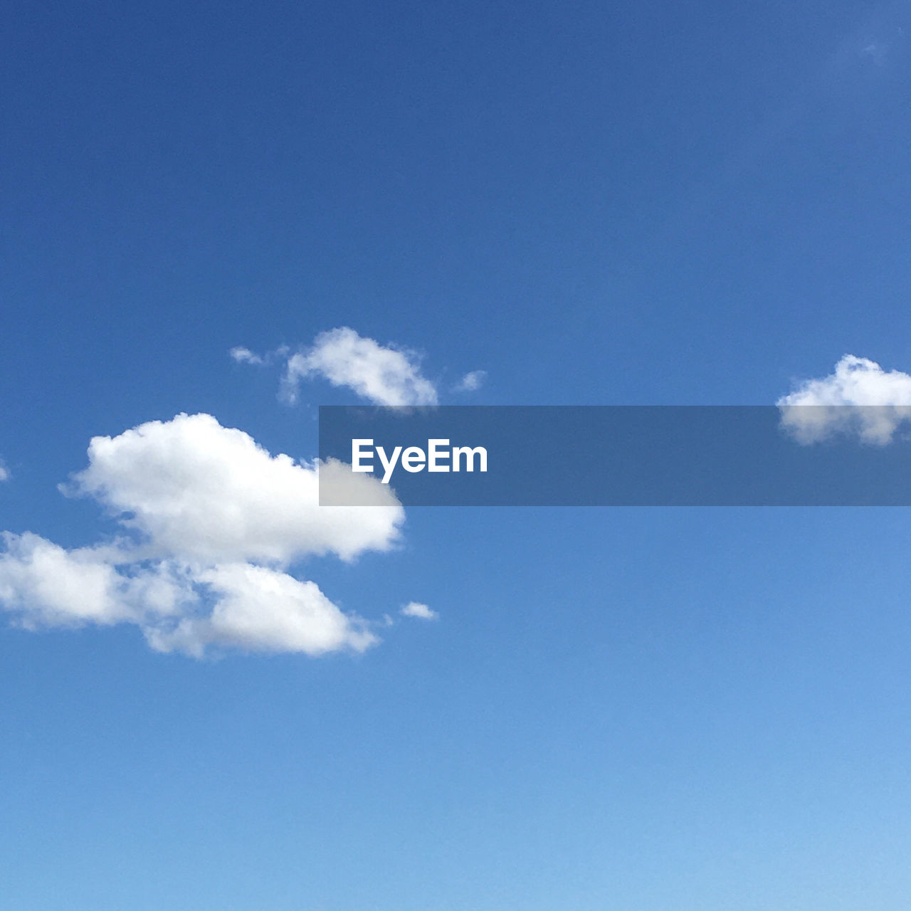 LOW ANGLE VIEW OF CLOUDS IN BLUE SKY