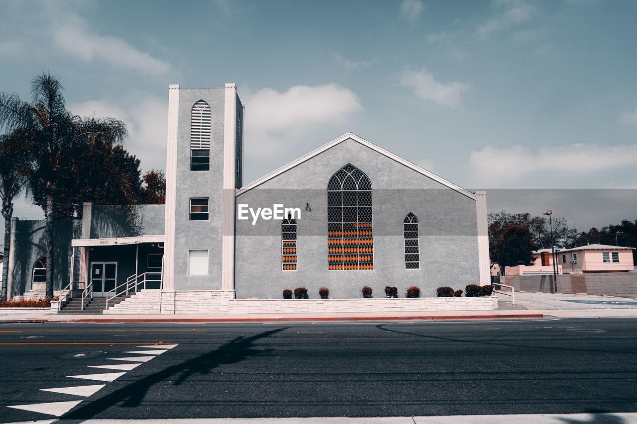 Church against sky in city