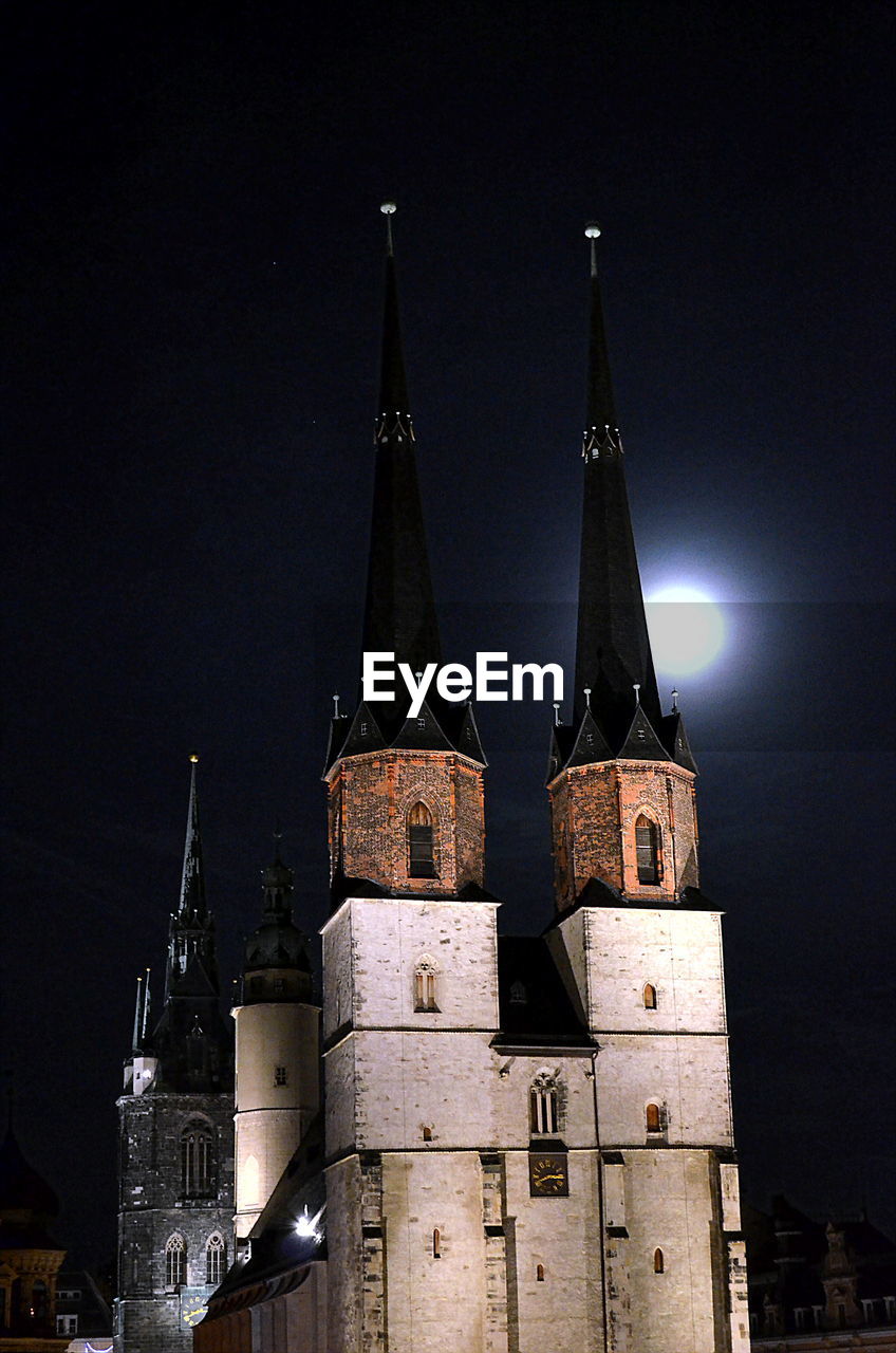 Low angle view of church against sky at night