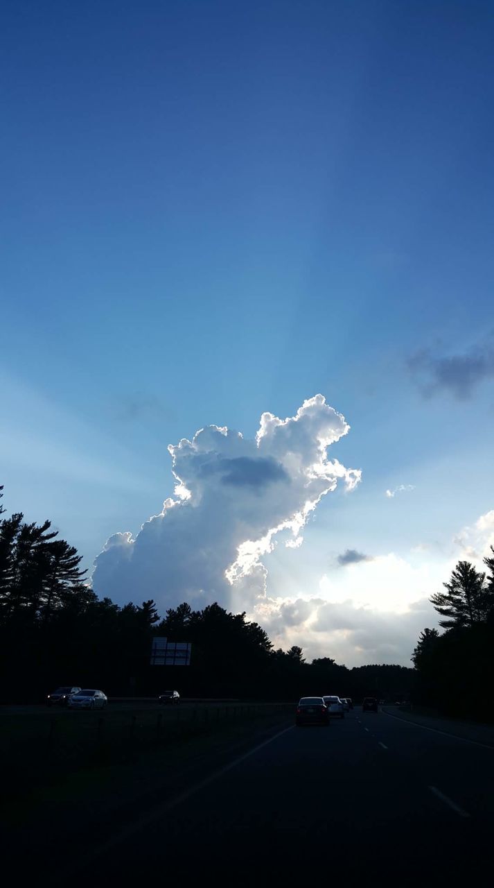 VIEW OF ROAD AGAINST BLUE SKY