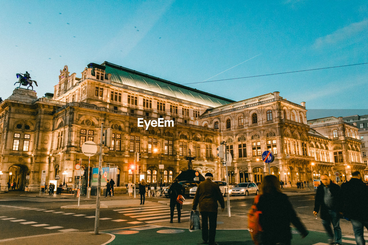 PEOPLE WALKING IN CITY