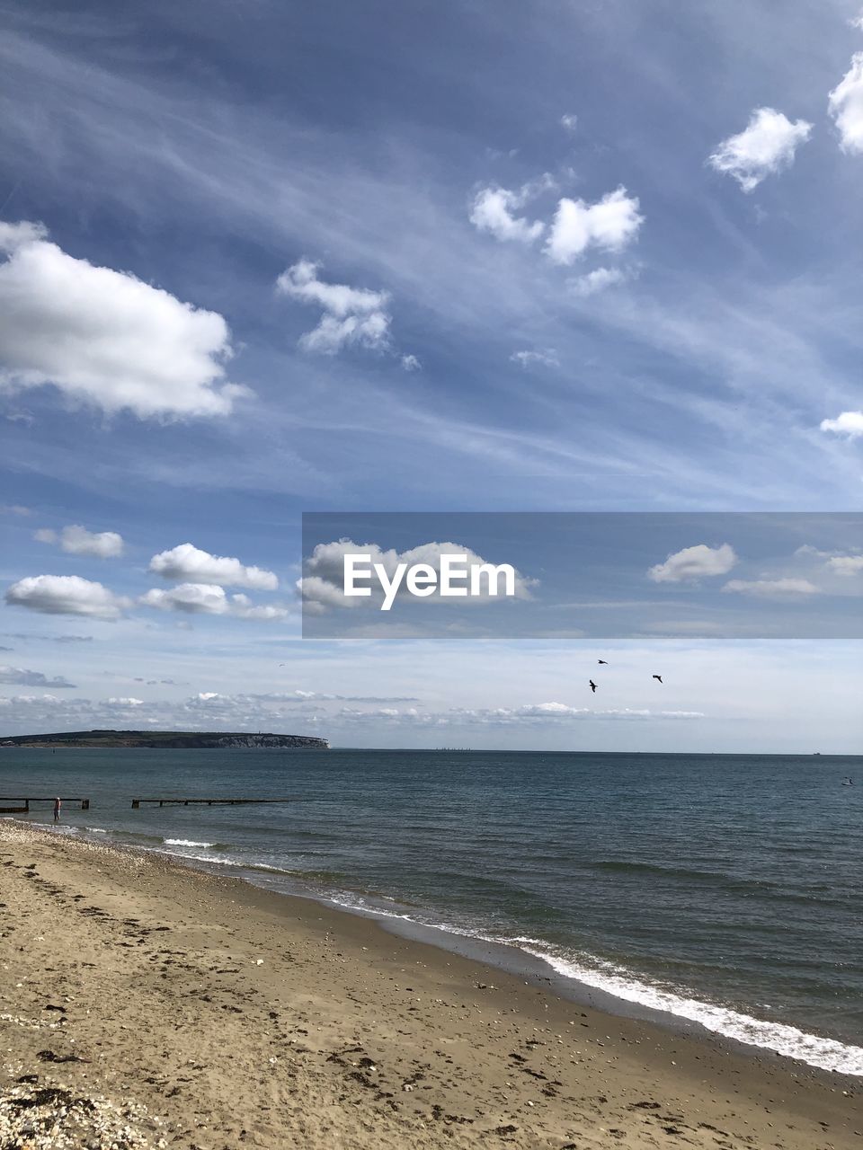 VIEW OF BEACH AGAINST SKY